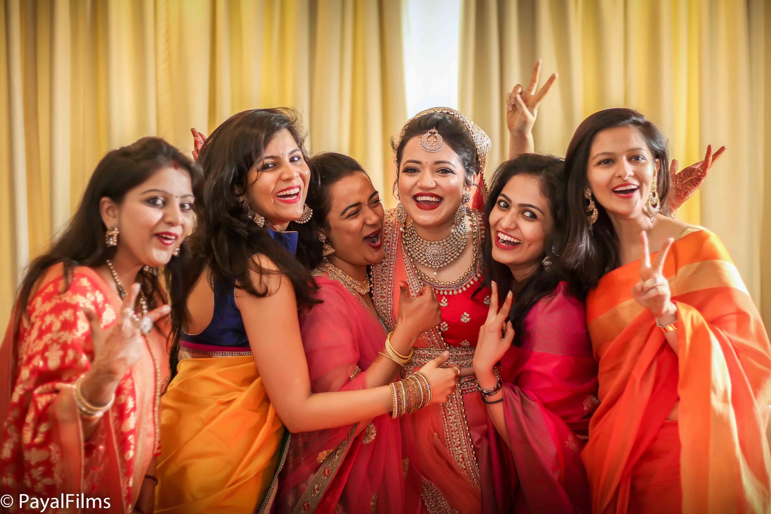 Payal Films bride making a grand entry with bridesmaids in colorful sarees at Khagaria wedding